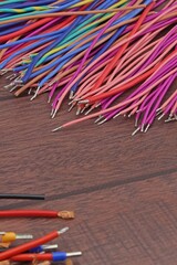 Copper stranded mounting electrical wires in colored insulation for electrical equipment. Close-up....