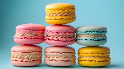 Fototapeta premium Colorful Macarons Stacked on Blue Background