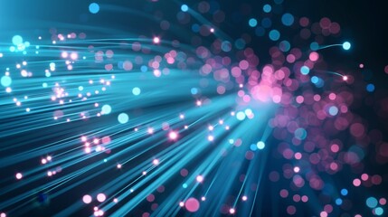 青とピンクの鮮やかな光ファイバーケーブルが照らされ、動的でエネルギッシュな視覚効果を生み出しています。光の軌跡とボケの要素が、未来的で技術的な雰囲気を高めています。この画像は、スピード、革新、そして現代の接続性を感じさせます。
