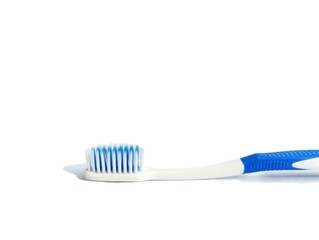 Blue and white toothbrush. Blue and white toothbrush on a white background 