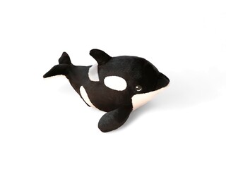 orca doll on white background © Adi