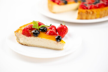 There's a slice of strawberry cheesecake on the plate. Menu for cafe, white background.