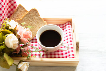 Glass cup with coffee and served with toasted bread  background Simple breakfast.
