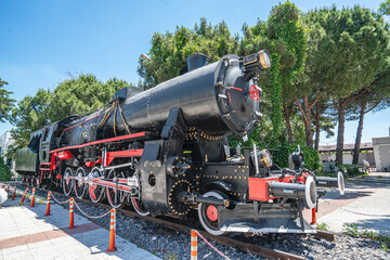 Steam locomotive in very bad condition, completely rusty and abandoned on the unused tracks at Uşak Rail way station.