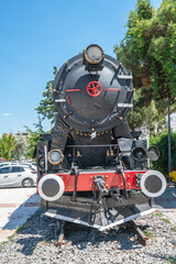 Steam locomotive in very bad condition, completely rusty and abandoned on the unused tracks at Uşak Rail way station.