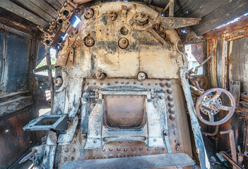 Steam locomotive in very bad condition, completely rusty and abandoned on the unused tracks at Uşak Rail way station.