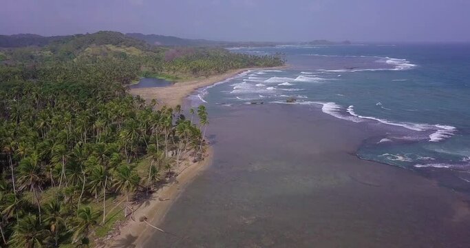 Aerial view of the mouth of the river at Viento Frio beach, Costa Arriba de Colon.
