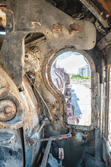 Steam locomotive in very bad condition, completely rusty and abandoned on the unused tracks at Uşak Rail way station.