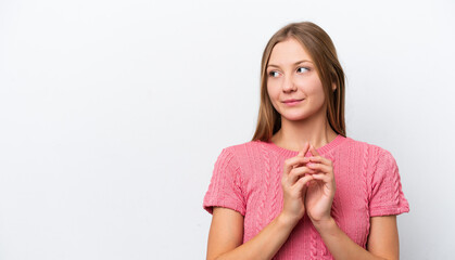 Young Russian woman isolated on white background scheming something