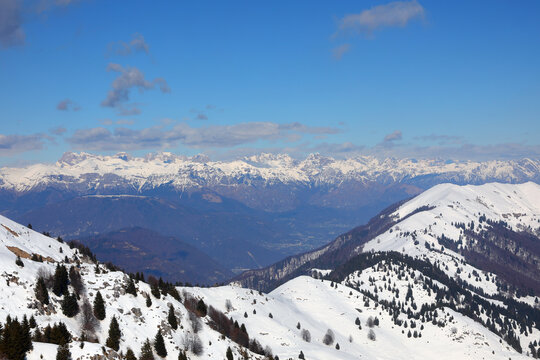 Snowy mountain panorama with snow in winter with blue sky and no people