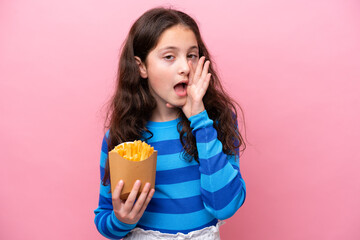 Little caucasian girl celebrating a birthday isolated on white background shouting with mouth wide open