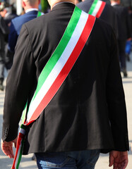 Italian mayors wearing the tricolor sash of the Italian flag during the parade through the city...