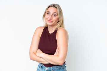 Fototapeta premium Young caucasian woman isolated on white background making doubts gesture while lifting the shoulders