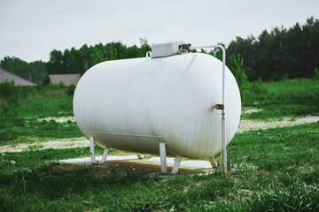 Propane tank providing clean energy to countryside home