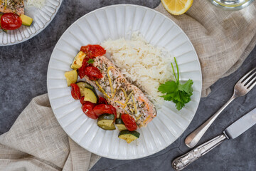Oven baked salmon and vegetables with rice