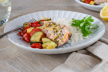Oven baked salmon and vegetables with rice
