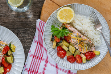 Oven baked salmon and vegetables with rice