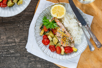 Oven baked salmon and vegetables with rice