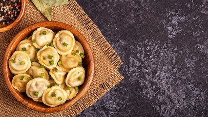 Homemade meat dumplings - russian pelmeni.