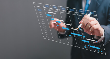 Businessperson managing project schedule with digital Gantt chart. Modern project planning, task management, progress tracking. Professional workspace, strategic efficiency, futuristic technology.