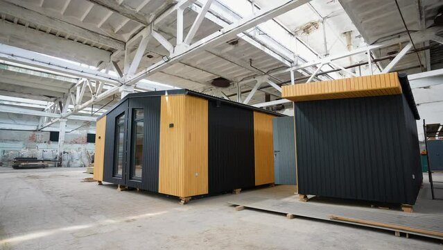 Modern mobile prefabricated modular home at a construction site