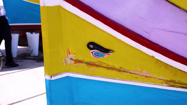 Marsaxlokk harbour with Traditional Luzzu fishing boats, a beautiful Mediterranean town on a sunny day. Old Colorful Boats. Malta 