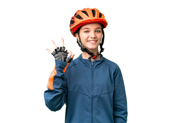 Teenager cyclist girl over isolated chroma key background showing ok sign with fingers