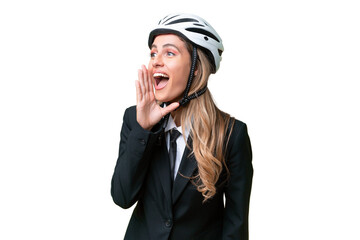 Business Uruguayan woman wearing a helmet biker over isolated background shouting with mouth wide open to the lateral