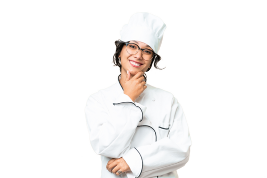 Young chef Argentinian woman over isolated background with glasses and smiling