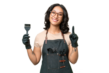 Young argentinian hairdresser woman over isolated background showing and lifting a finger in sign of the best