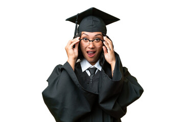 Young university graduate Argentinian woman over isolated background with glasses and surprised