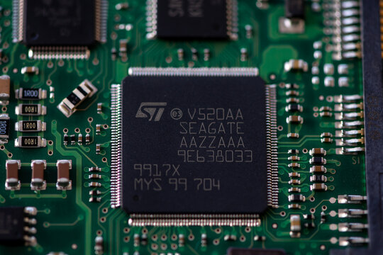 Timisoara, Romania - March 21, 2019: Close-up of a ST V520AA Seagate HDD cotroller. Electronic components
