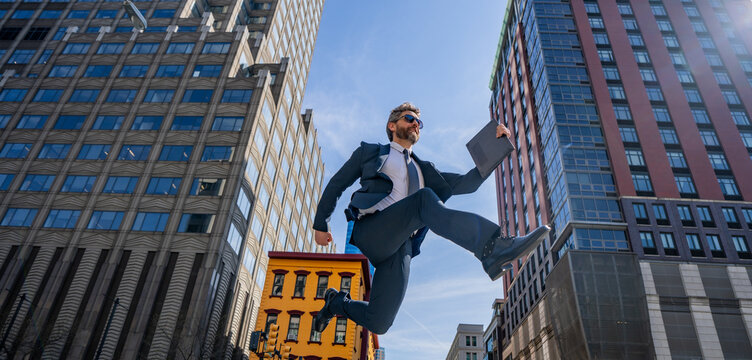 Businessman jumping in the street. Next Jump and Steps. Business Ambitions concept. Goal business success strategy. Creative growth development. Growth jump business success process. Jump Forward.