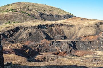 The scenic views of The Kula Divlit Volcanic Park, located in the Kula-Salihli Geopark,  Kula district, contain all of the landforms that resulted from the third stage of volcanic activity.