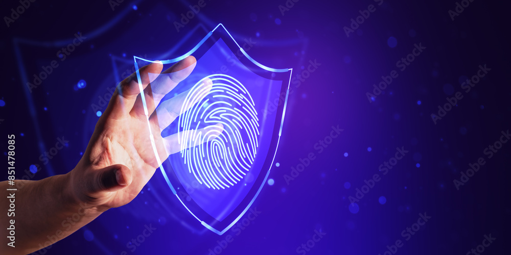 Poster a hand touching a digital fingerprint on a shield symbol, representing cybersecurity, on a blue boke