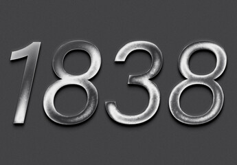 Chrome metal 3D number design of 1838 on grey background.