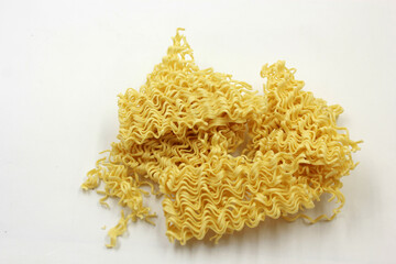 dry noodles, egg noodles, isolated on a white background