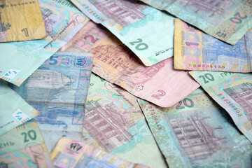 Processed collage of Ukrainian Hryvnia UAH bills banknotes texture. Background for banner