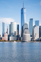 Obraz premium Manhattan's beautiful skyline, New York, United States. Panorama view of New York city skyline in Midtown Manhattan. USA NYC. American big city. Lower Manhattan skyline at sunny day.