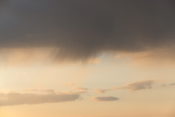 Photo background texture, thundercloud in the sky before sunset, close-up photo.