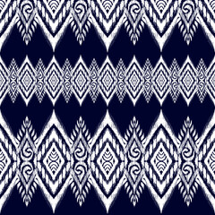 Ikat floral paisley embroidery on background.geometric ethnic oriental pattern traditional.Aztec style abstract vector illustration.design for texture,fabric,clothing,wrapping,decoration.
