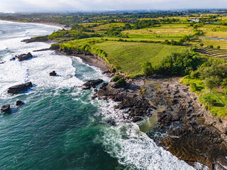 Cliff sea coast near Tanah Lot, Bali, Indonesia.