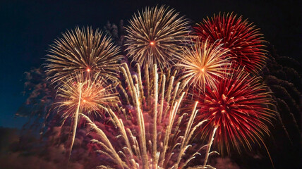 Canada Day Night Sky Aglow: Stunning Red and White Fireworks Display.