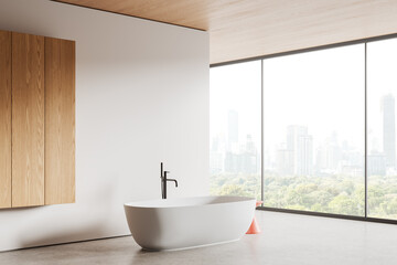 Elegant home bathroom interior with tub near window. Mockup wall