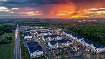 Obraz premium Drone of Epic Sunset in New Jersey Suburbs Homes 