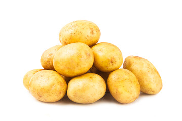 Young potatoes. Raw potatoes isolated on white background.Peel potatoes.Harvesting collection. organic, freshly dug potatoes. Agricultural background. Vegan. Vegetables.Potato slices.