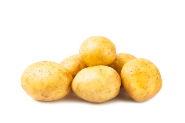 Young potatoes. Raw potatoes isolated on white background.Peel potatoes.Harvesting collection. organic, freshly dug potatoes. Agricultural background. Vegan. Vegetables.Potato slices.