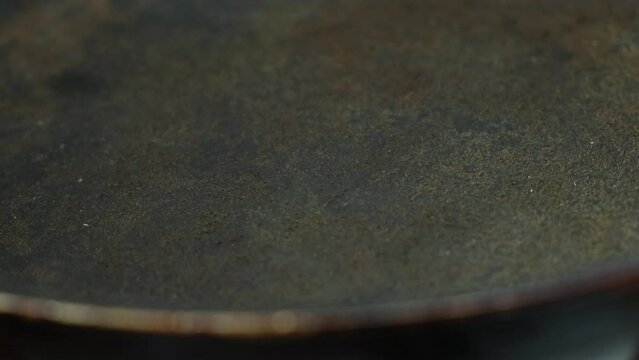 the frying pan on which the top non-stick layer of Teflon was damaged	