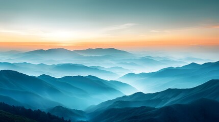 Misty Mountain Range at Sunrise with Silhouetted Peaks and Soft Sky Tones Depicting Tranquil Landscape Serenity