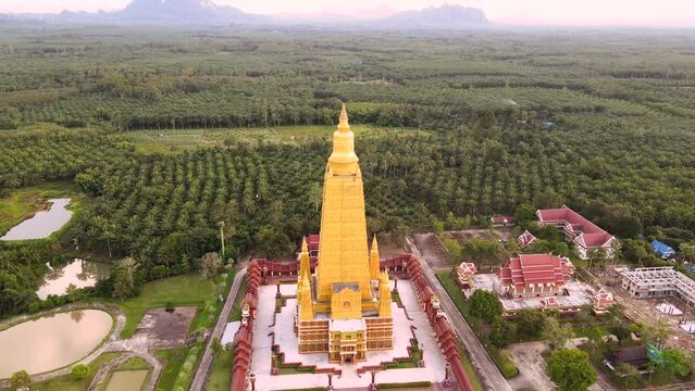 Drone video, high angle, Wat Mahathat Wachira Mongkhon (Wat Bang Thong), Krabi Province, 46 Moo 3, Na Nuea Subdistrict, Ao Luek District, Krabi 81110 Thailand.
